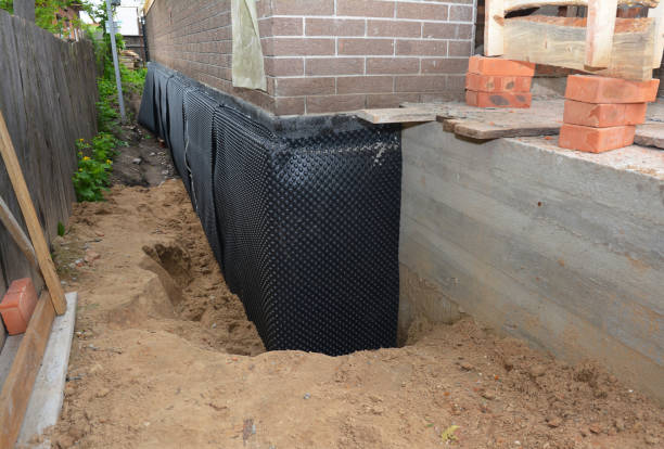 Happy homeowners after waterproofing job in Markesan